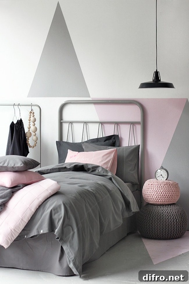 Pink and gray bedroom with triangular color blocking