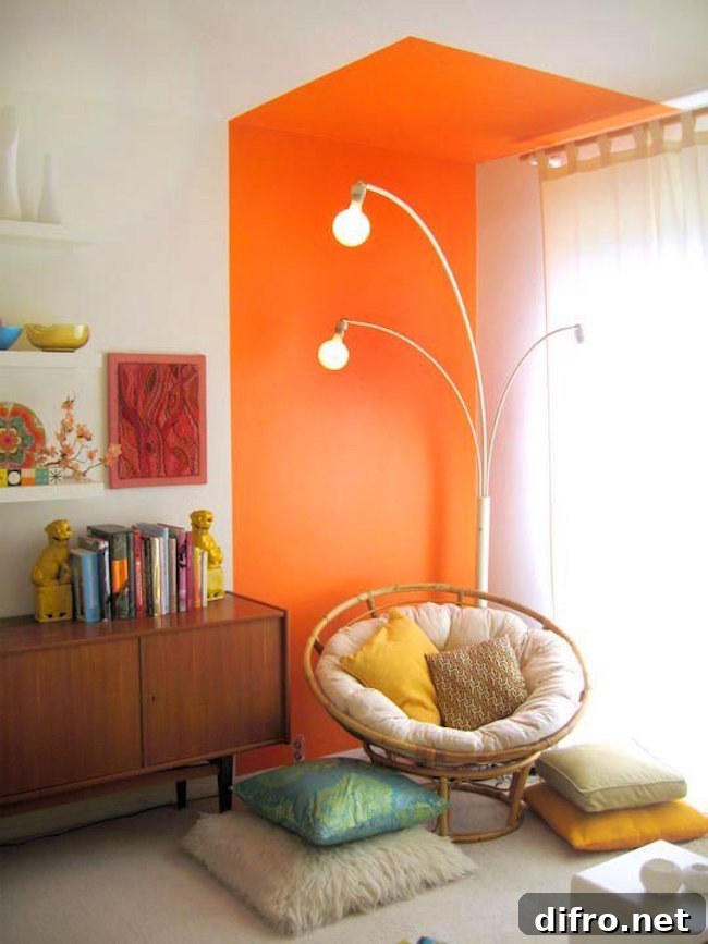 Bright orange reading nook that goes right up to the ceiling
