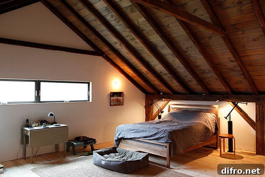 Gorgeous rustic bedroom design on the top level of the barn home