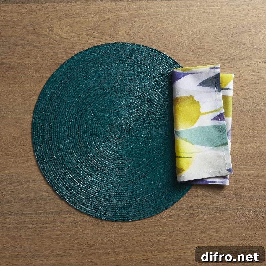 Teal placemat and linen napkin from Crate & Barrel