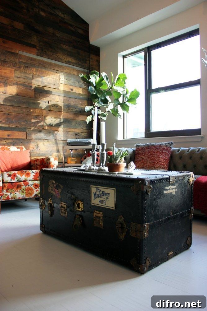 Old trunk complete with stickers used as coffee table