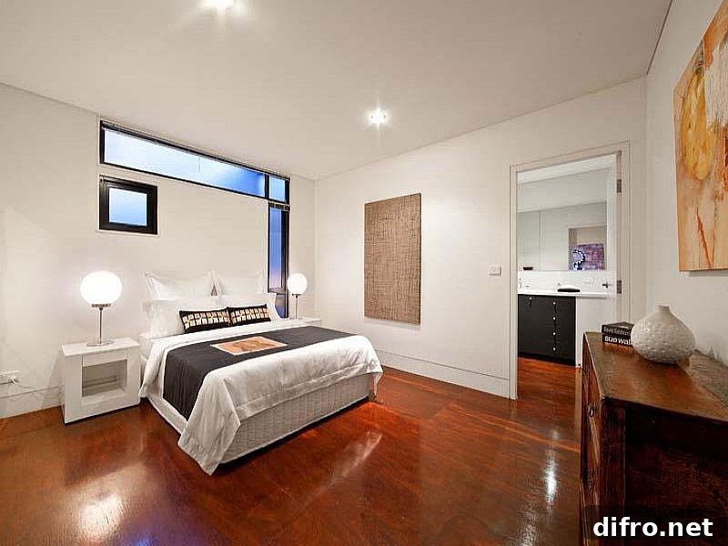 Gorgeous wooden floors bring inviting warmth to the interior