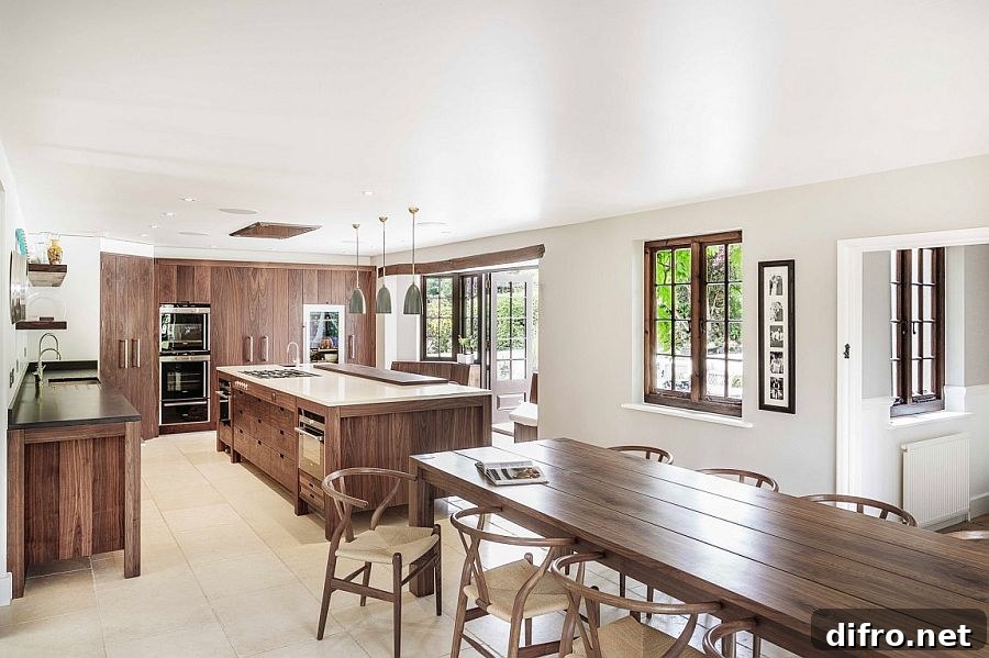 White kitchen with cabinets, island and workstation in wood