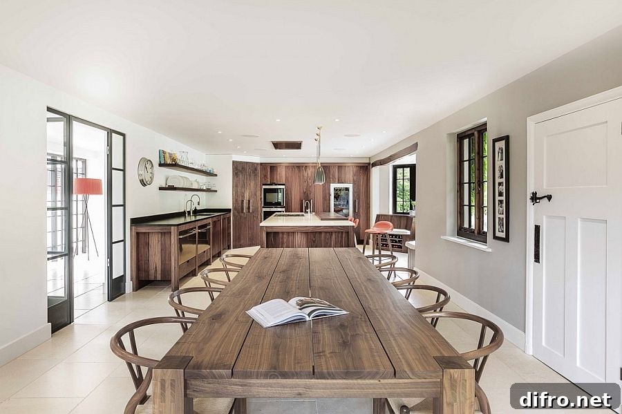 Large wooden dining table and classic wishbone chairs