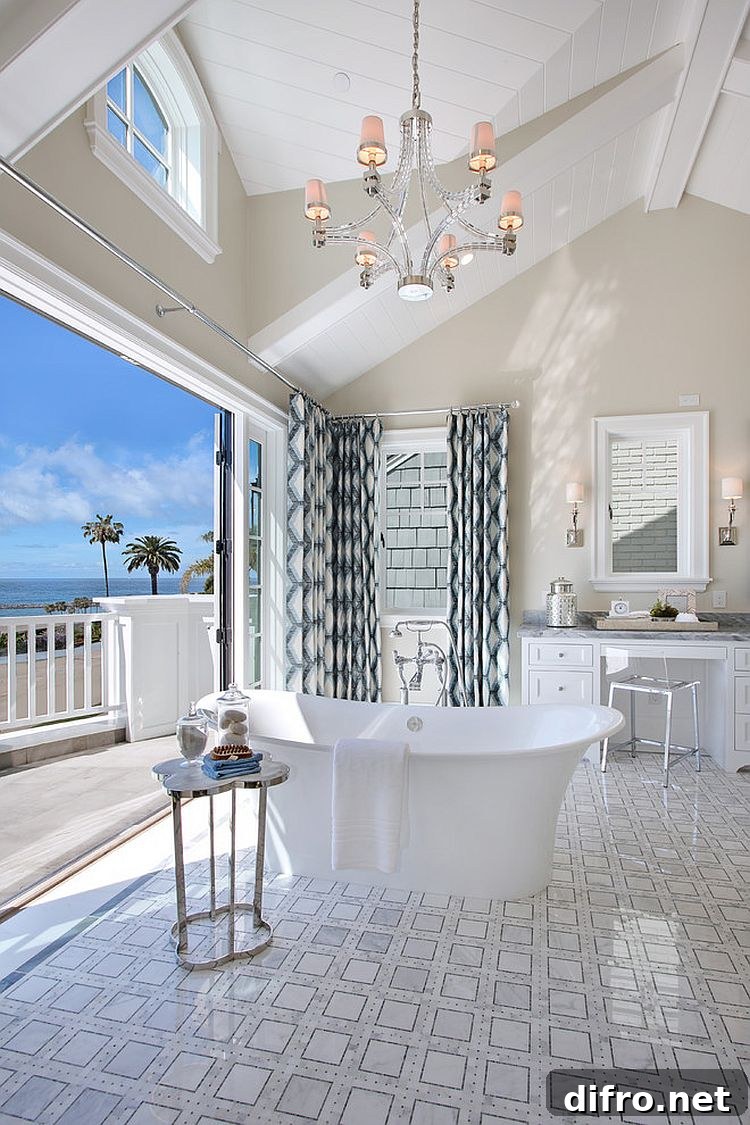 Beach style bathroom flows into the private balcony and master bedroom [Design: Spinnaker Development]