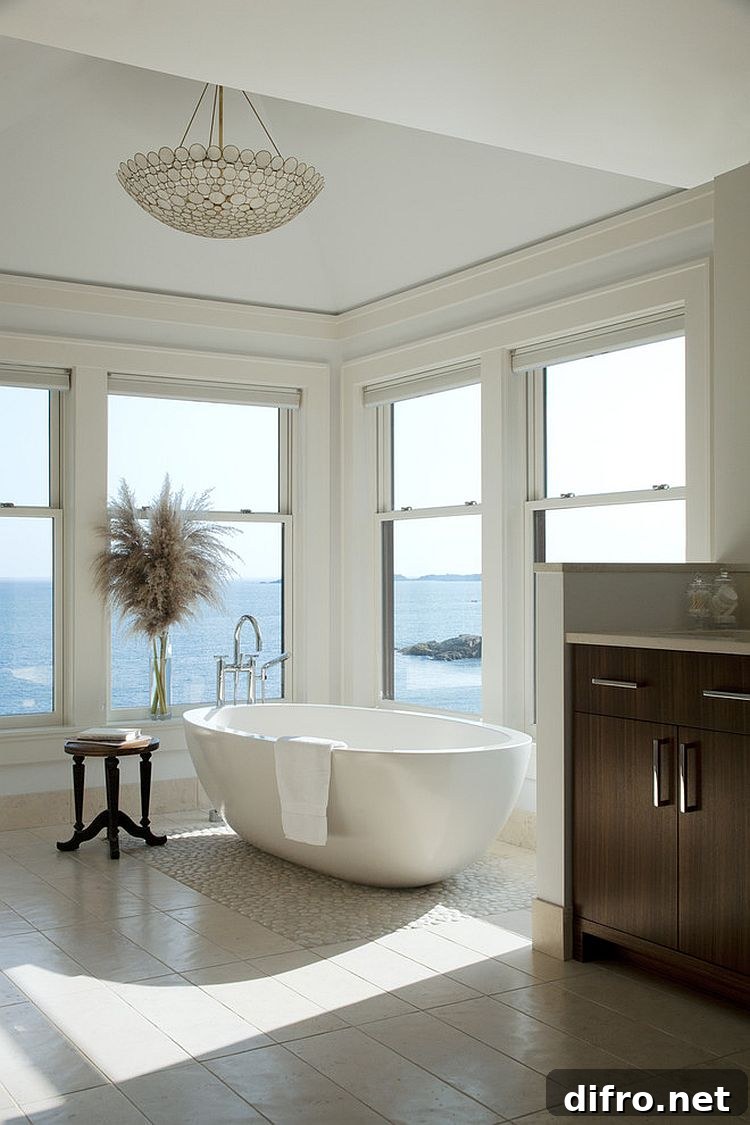 Neutral hues let the view shine through in the master bath [Design: LDa Architecture & Interiors]