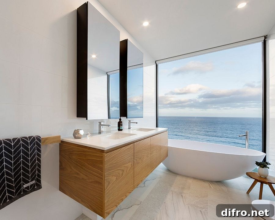 Wooden vanity adds warmth and contrast to the contemporary bathroom [Design: John Wheatley UA Creative]