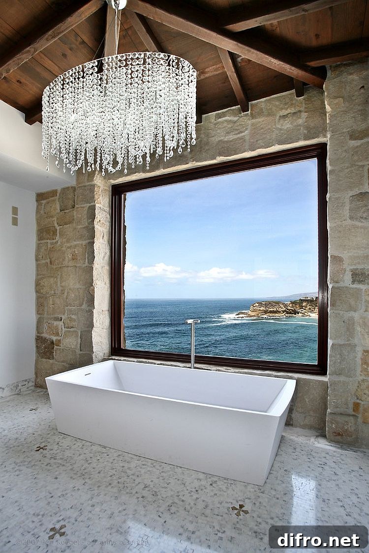 Antique stone and marble bathroom showcases modern Mediterranean style [Design: Ancient Surfaces]