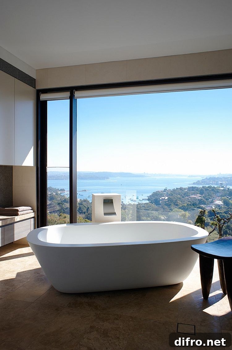 Framing the distant view turns the minimal bathroom into a relaxing retreat [Design: Leung Architects]