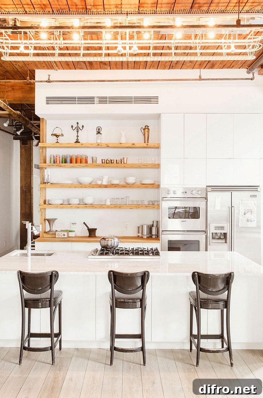 Industrial style kitchen with sleek, open wooden shelves