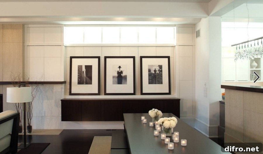 Modern dining table covered in votive candles