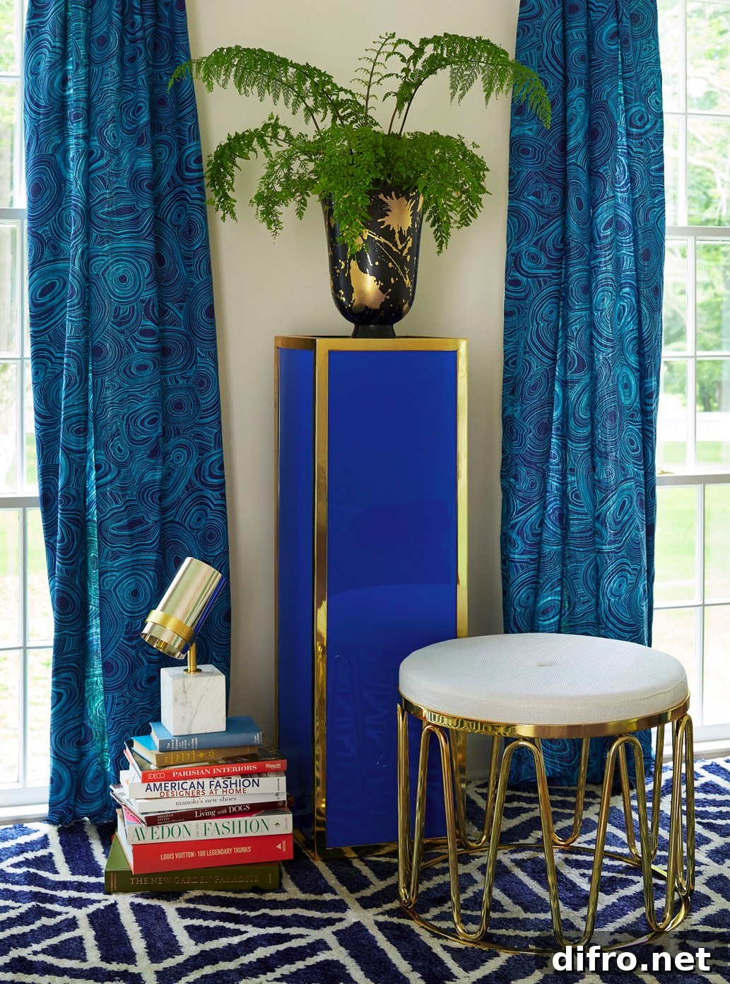 Blue Lucite pedestal table from Jonathan Adler