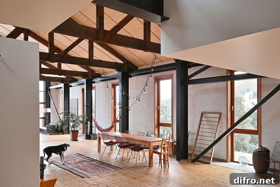 An element of industrial style also creeps into the lighting fixtures inside the family residence