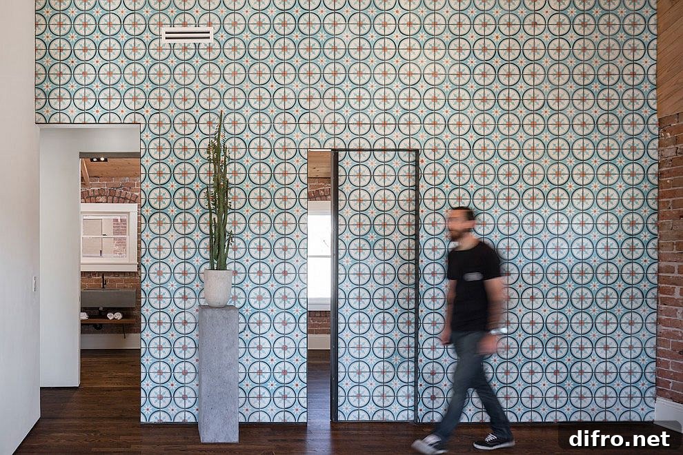 Contemporary renovation adds color and pattern to the brick-wallled interior