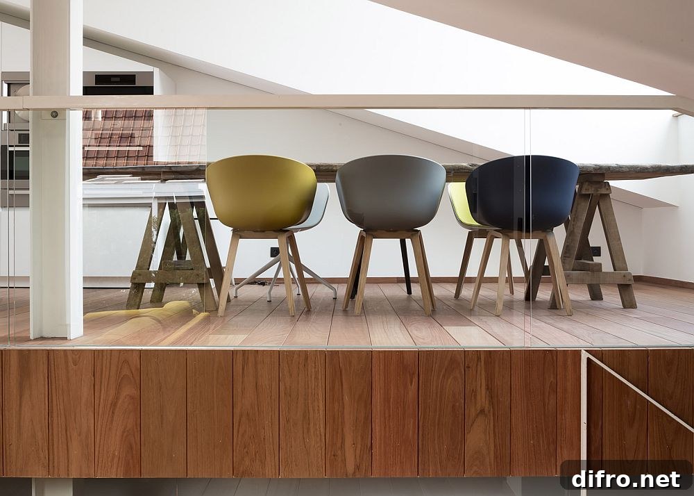 Dining room chairs bring a touch of color to the interior