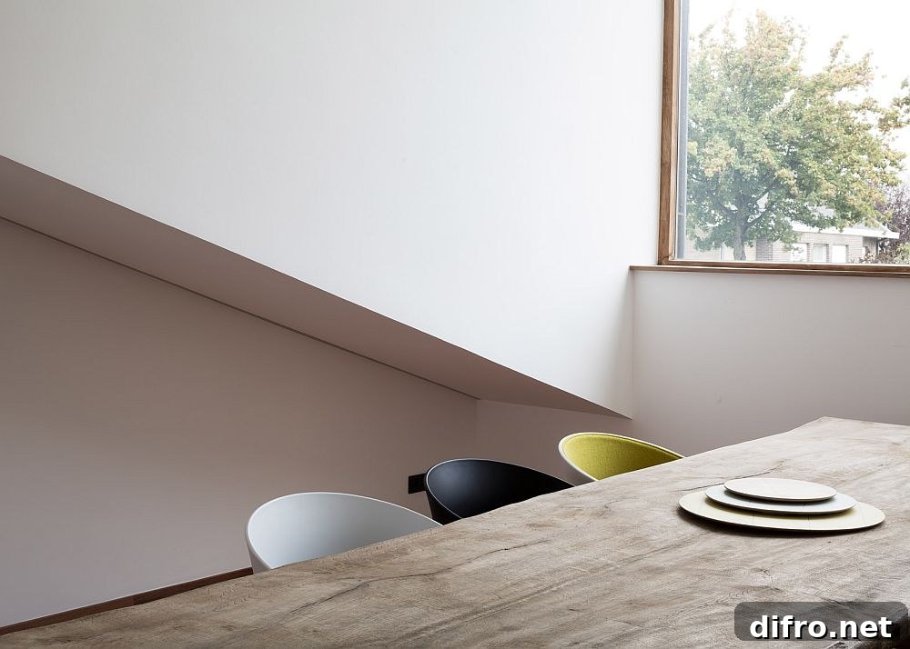 Large glass window next to the dining table also offers a view of the outdoors