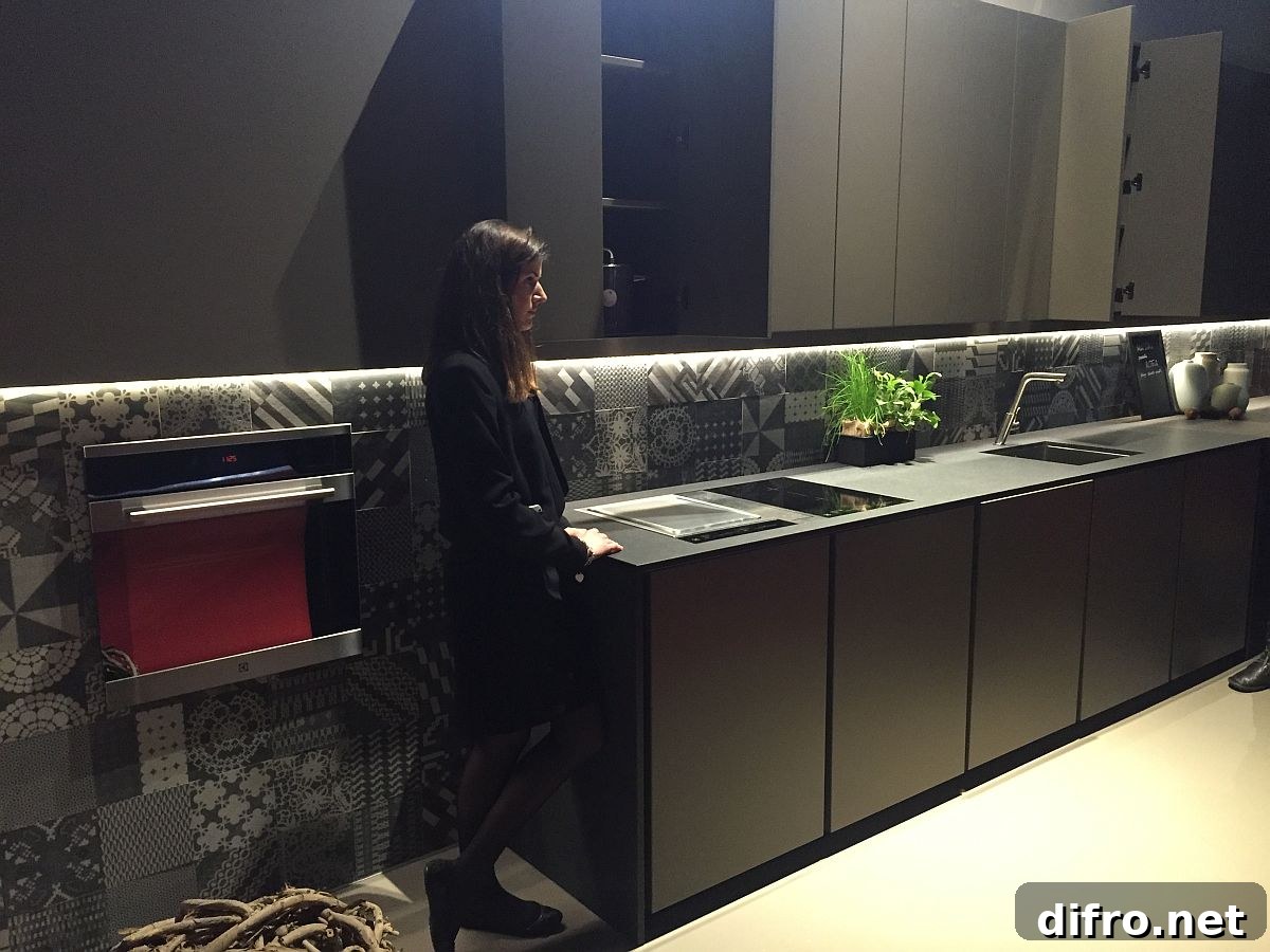 Unique kitchen backsplash with tiles that add pattern without altering the color scheme