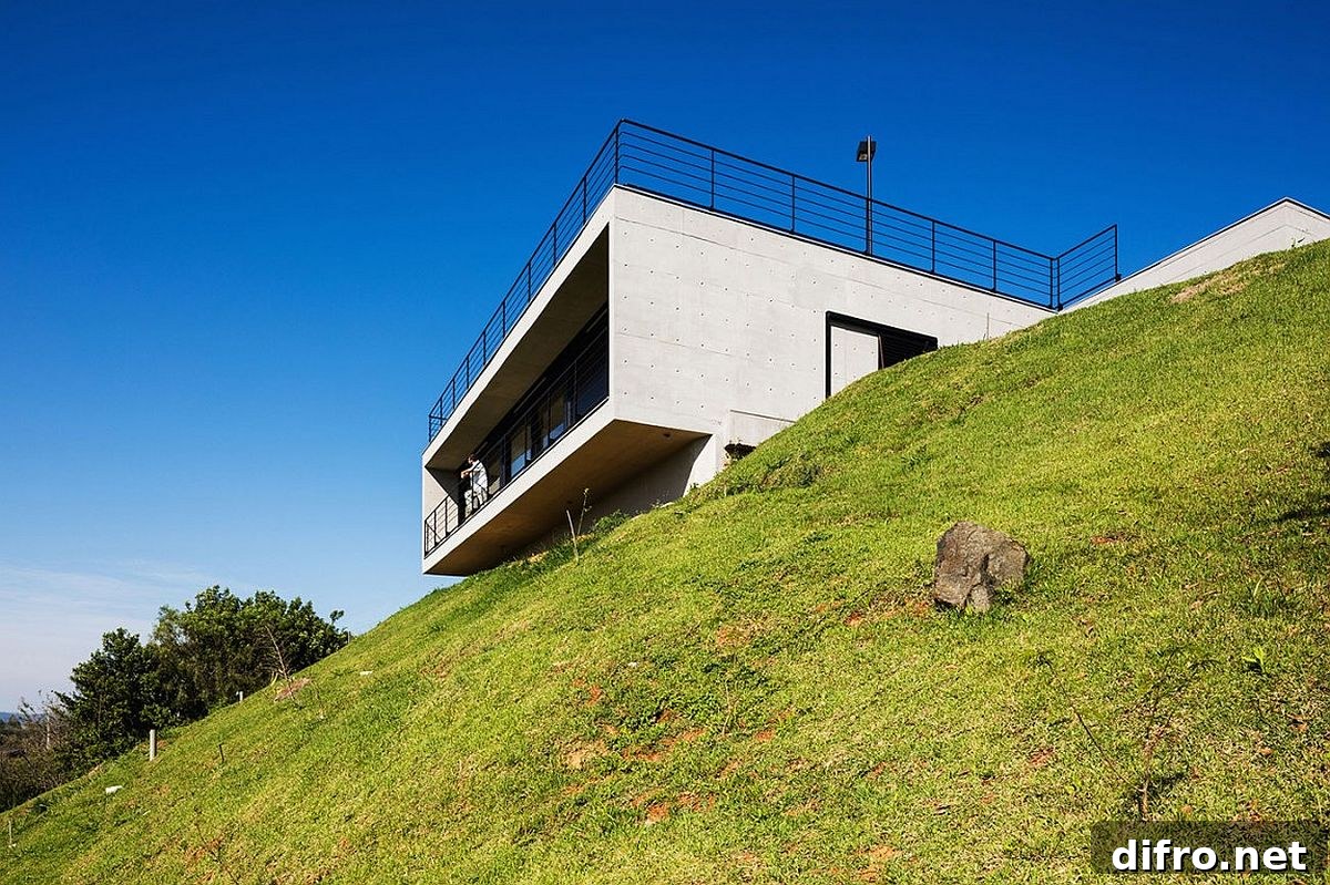 Stylish contemporary home located on a steep, hilly site in Brazil with amazing views