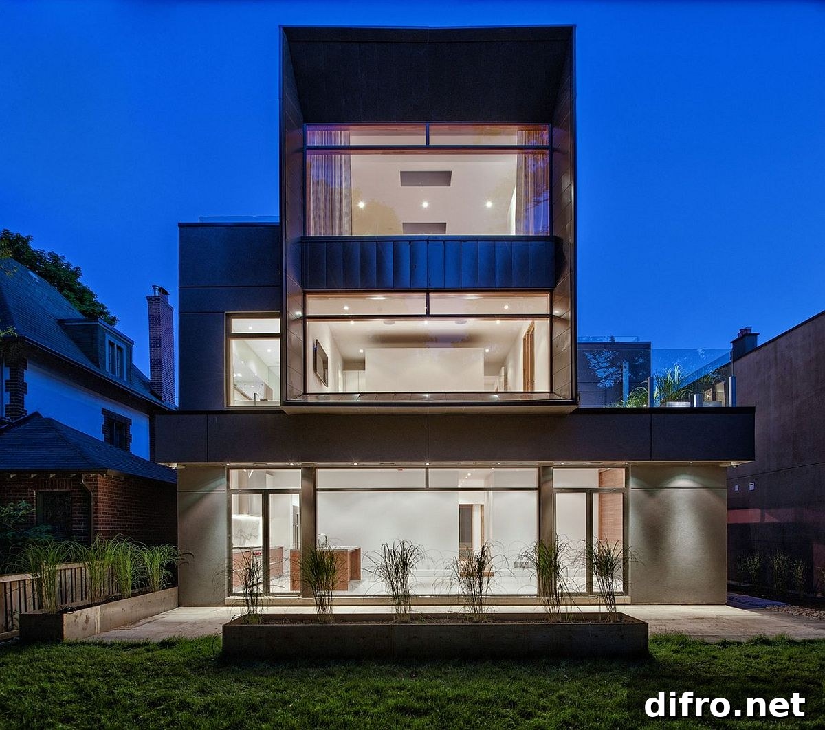 Rear facade of the home opens up to the garden and the view beyond