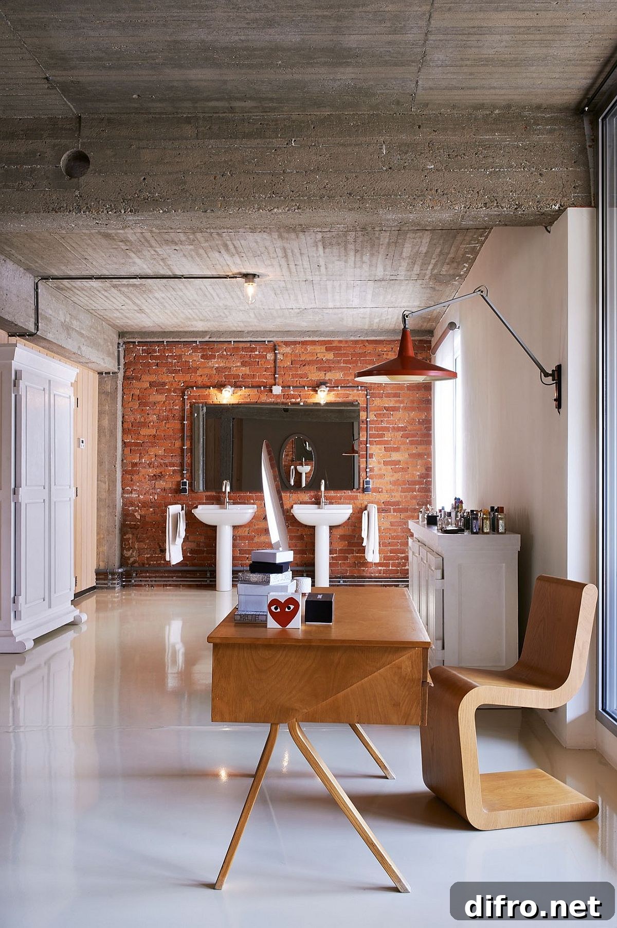Modern bathroom with exposed brick wall