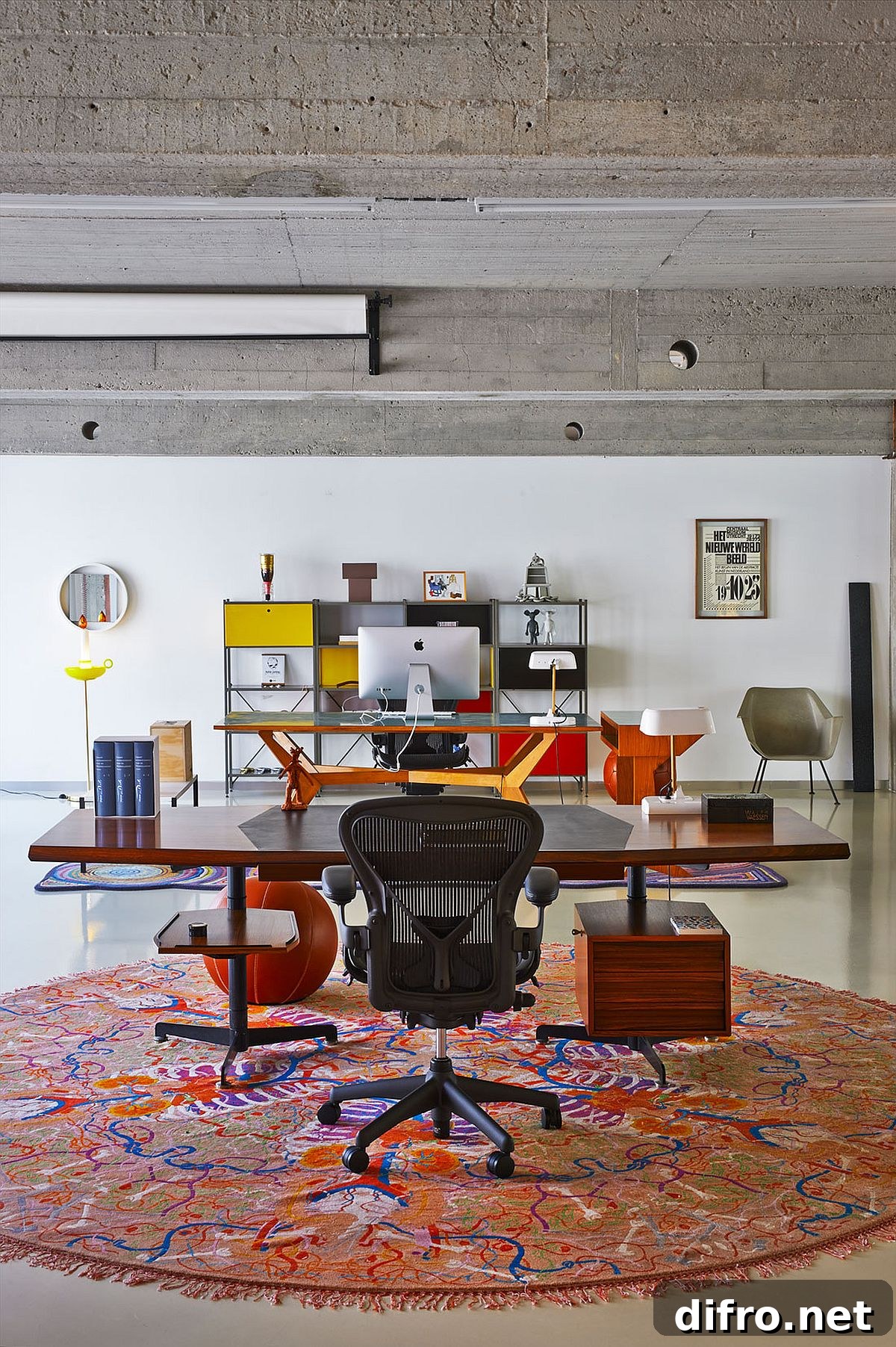 Lovely rug defines the workspace in the open area