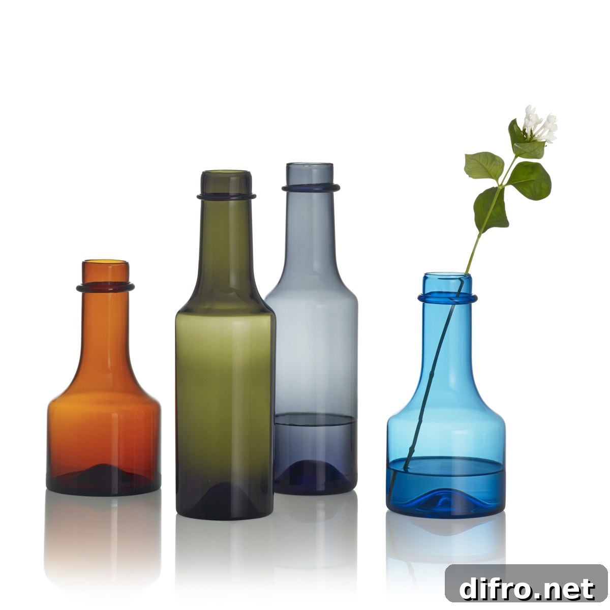 Wirkkala glass bottles. Designed by Tapio Wirkkala and originally produced by Iittala between 1959 and 1968. Image © Fiskars Finland.