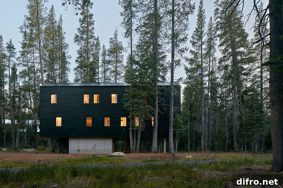 Dark exterior of the cabin allows it to blend in with the landscape after sunset