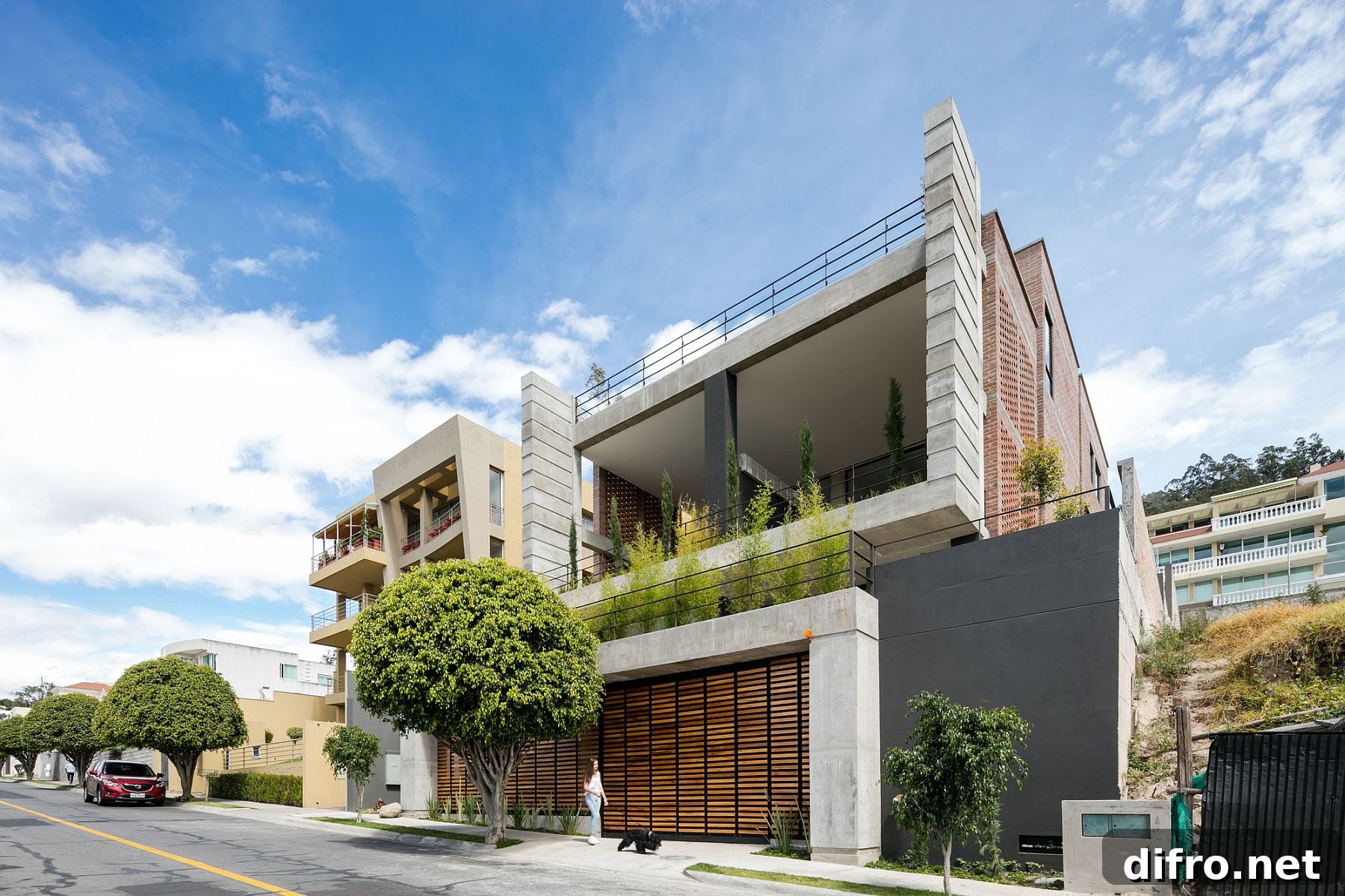 Double story porch shapes the street facade of the house