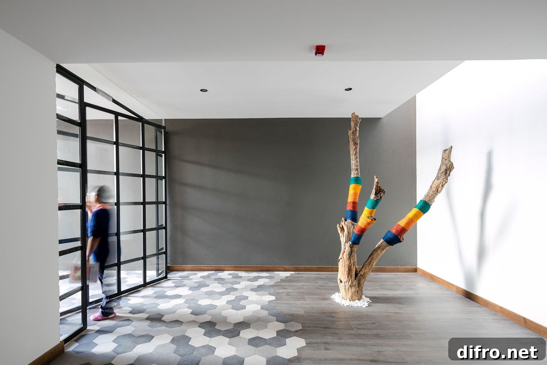 Hexagnal floor tiles bring contrast to the interior