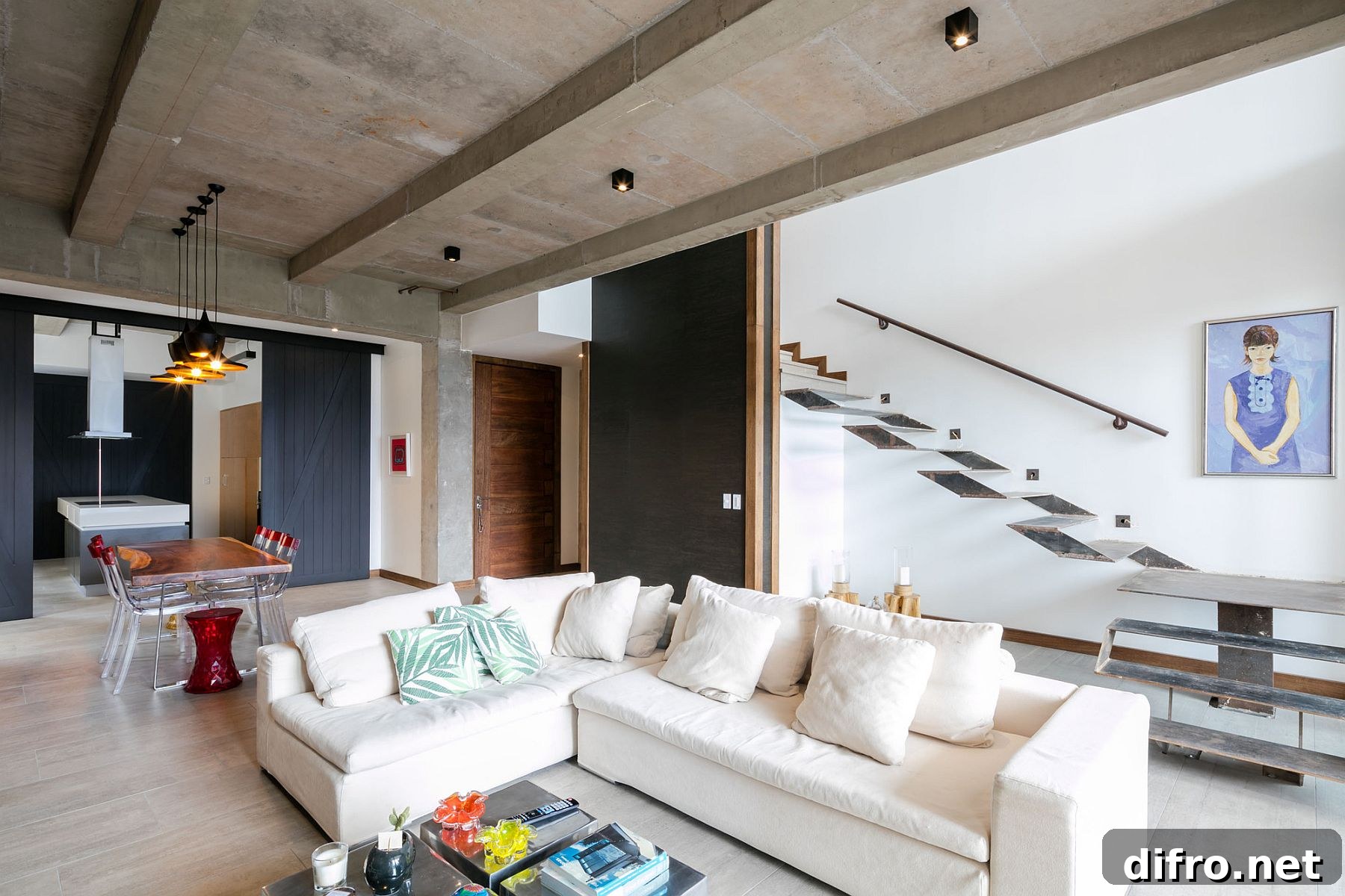 Cast-in-place concrete ceiling and beams are left exposed iniside the apartment