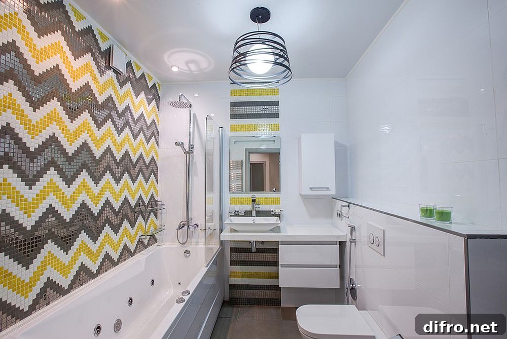 Chevron patterned tile design in yellow and gray create a striking bathroom [Design: Eugene Shimkevich]