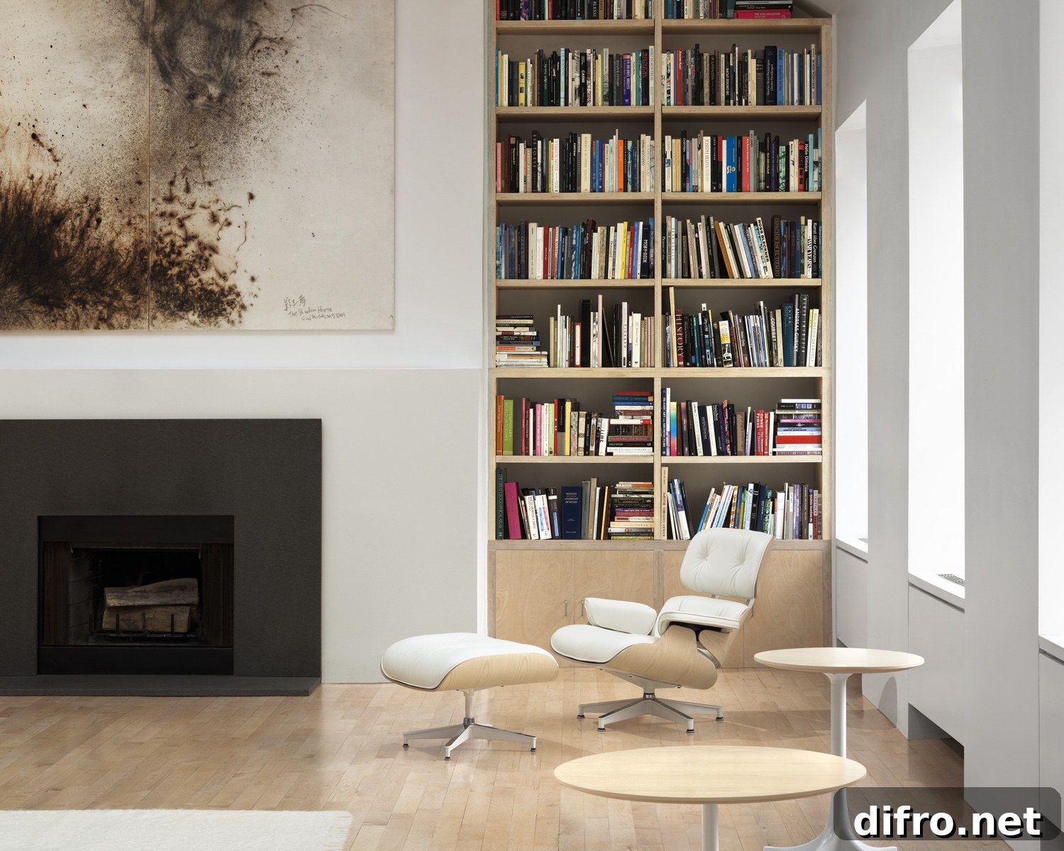 Eames Lounge Chair and Ottoman in white ash and pearl leather.