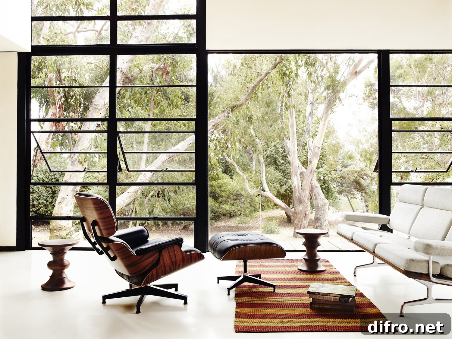 Classic Eames Lounge Chair and Ottoman in black leather.