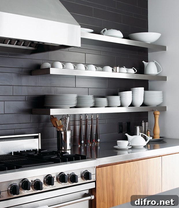 Floating Shelf Ideas to Style Your Living Room 12 Charcoal ceramic tiles, walnut cabinetry and stainless steel shelves are a winning trio in this stylish kitchen.