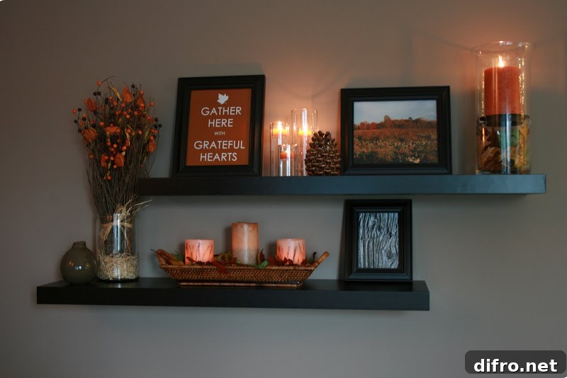 Floating Shelf Ideas to Style Your Living Room 3 Floating shelves with candles, flowers, and a picture that reads "Gather Here, Grateful Hearts"
