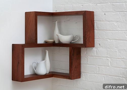 Floating Shelf Ideas to Style Your Living Room 4 Two floating shelves mounted in the corner carrying white dish-ware.