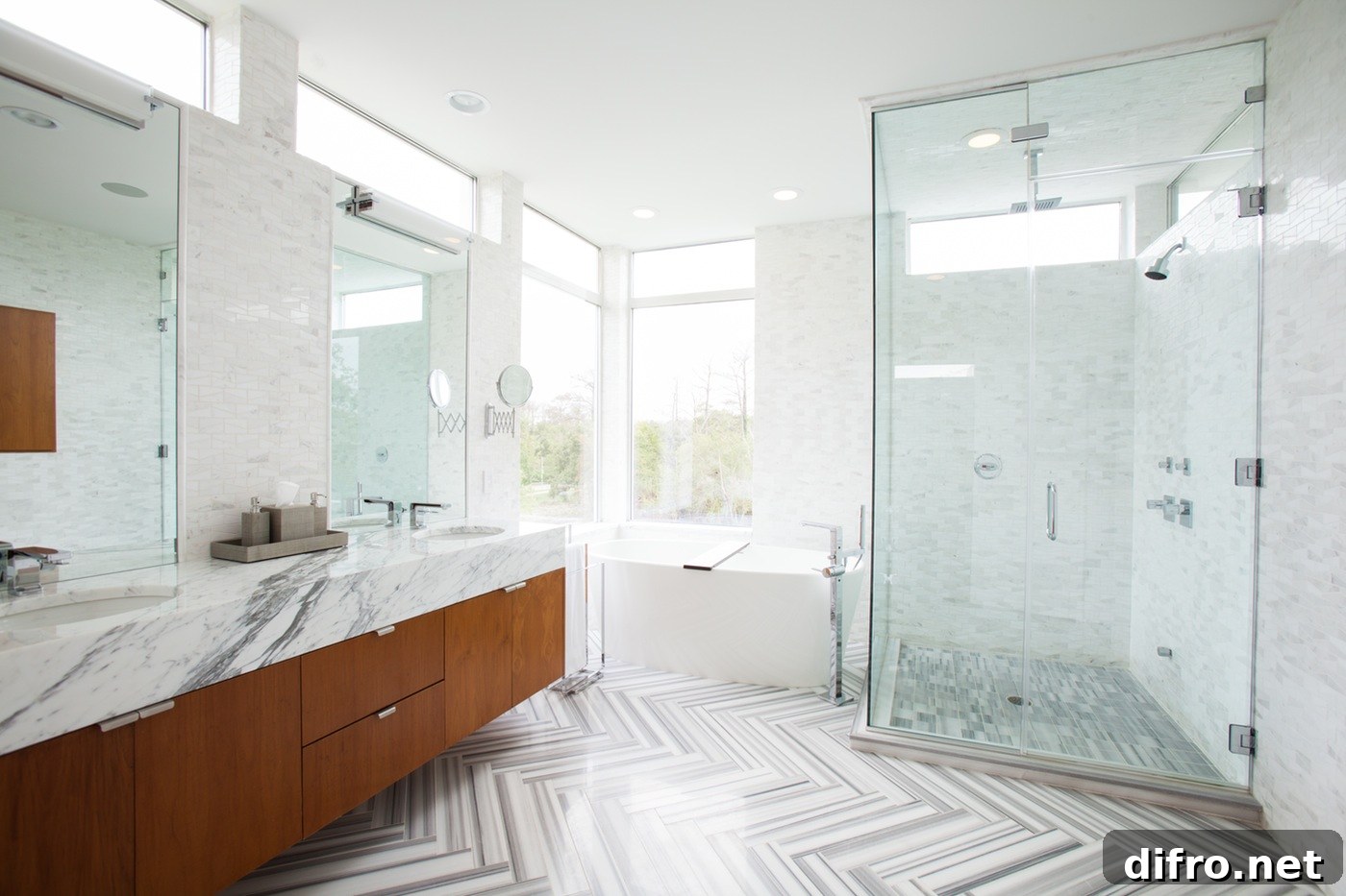 A spacious bathroom featuring a large-sized shower area with a walk-in shower and wood vanity.
