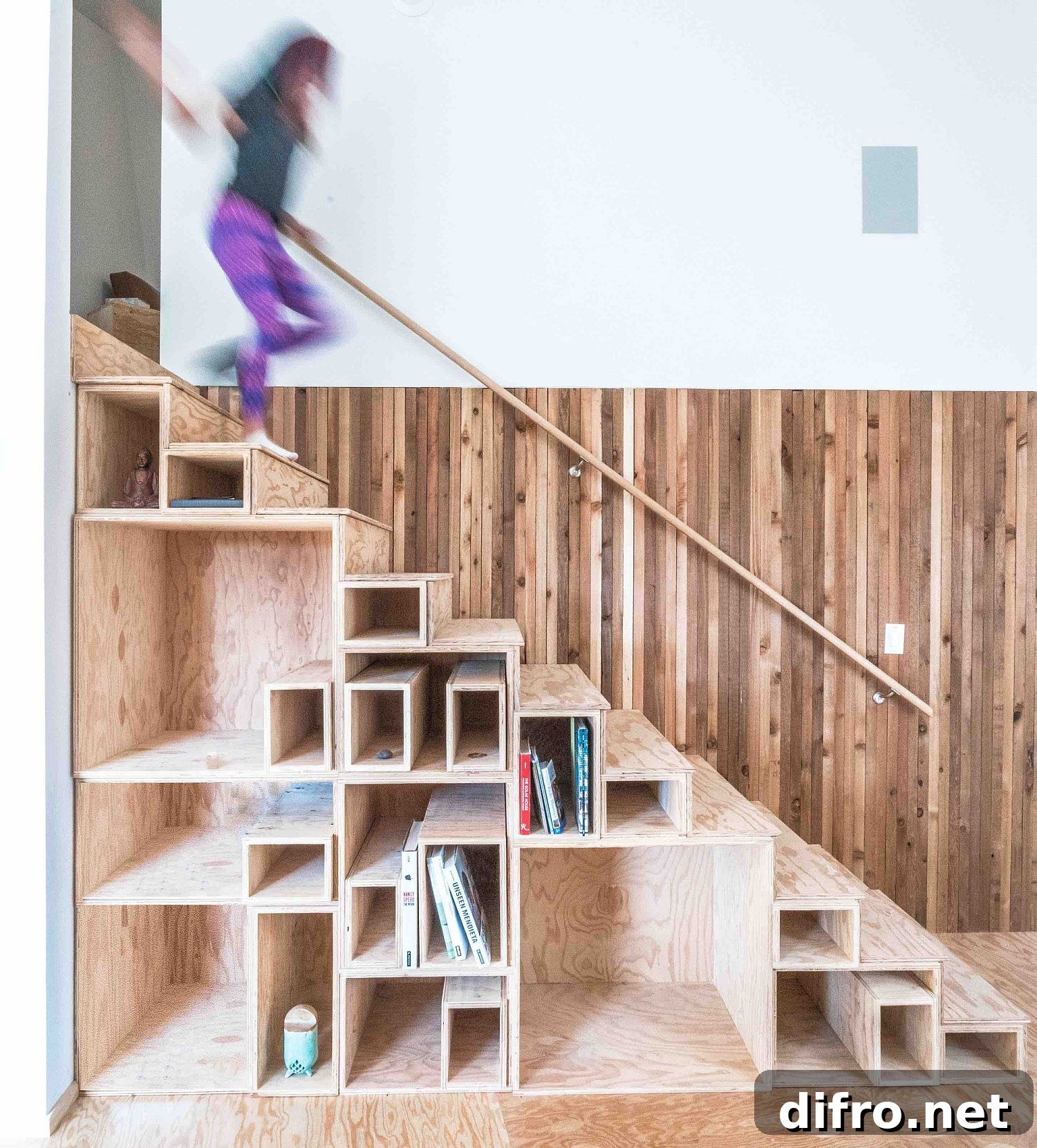 Space-savvy staircase with built-in shelving