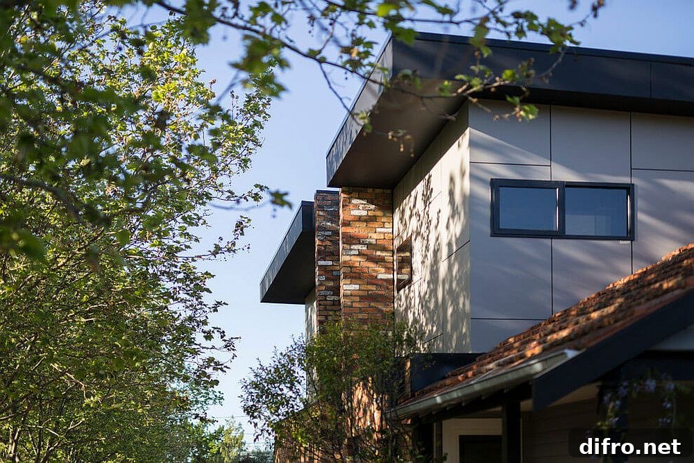 Contemporary exterior with brick and tile accents
