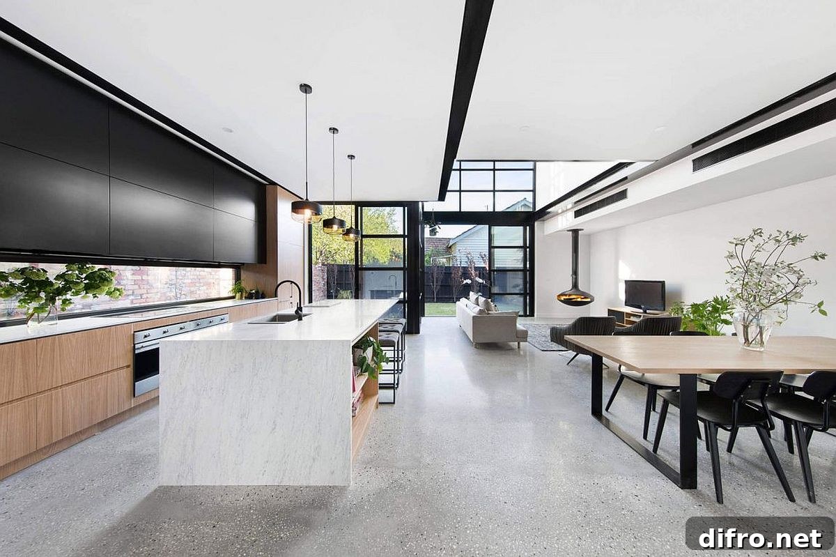 Open neutral living room with black accents