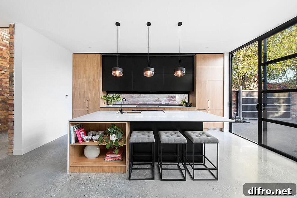 Kitchen island lit by pendant lights
