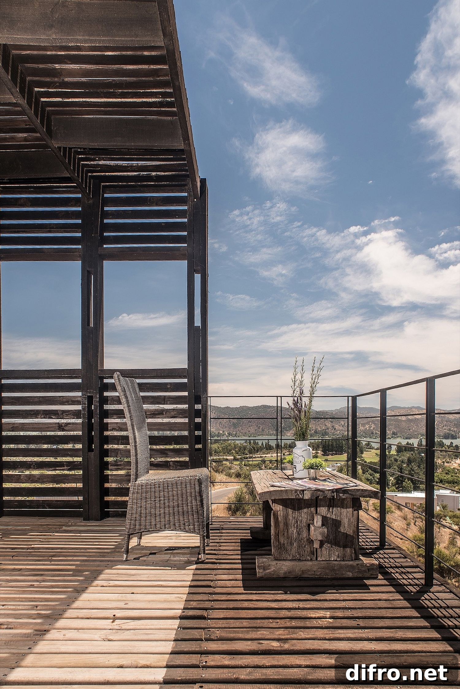 Minimal wooden deck overlooking the landscape