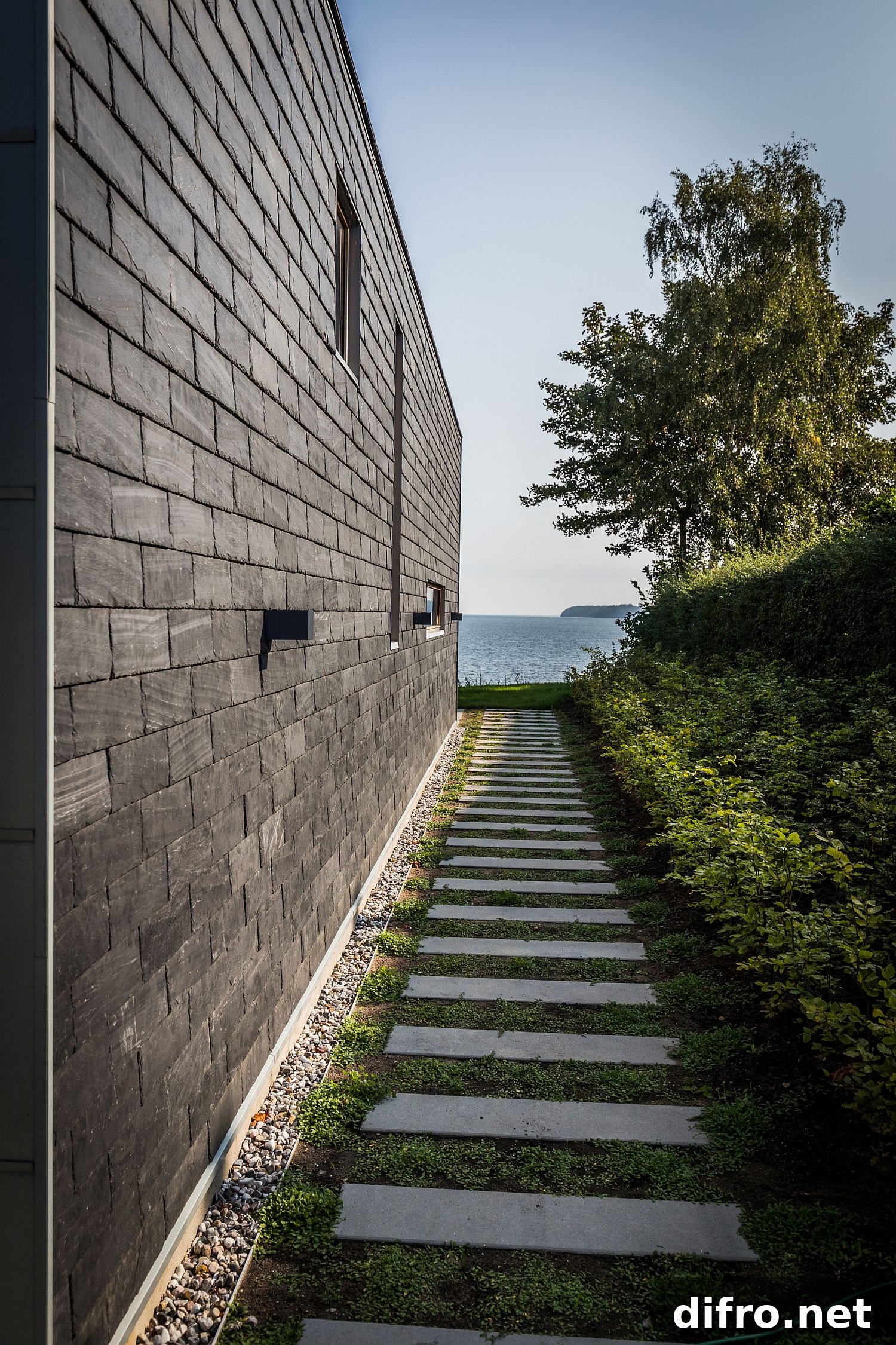 Stone walkway through garden leading to the beach from Villa P
