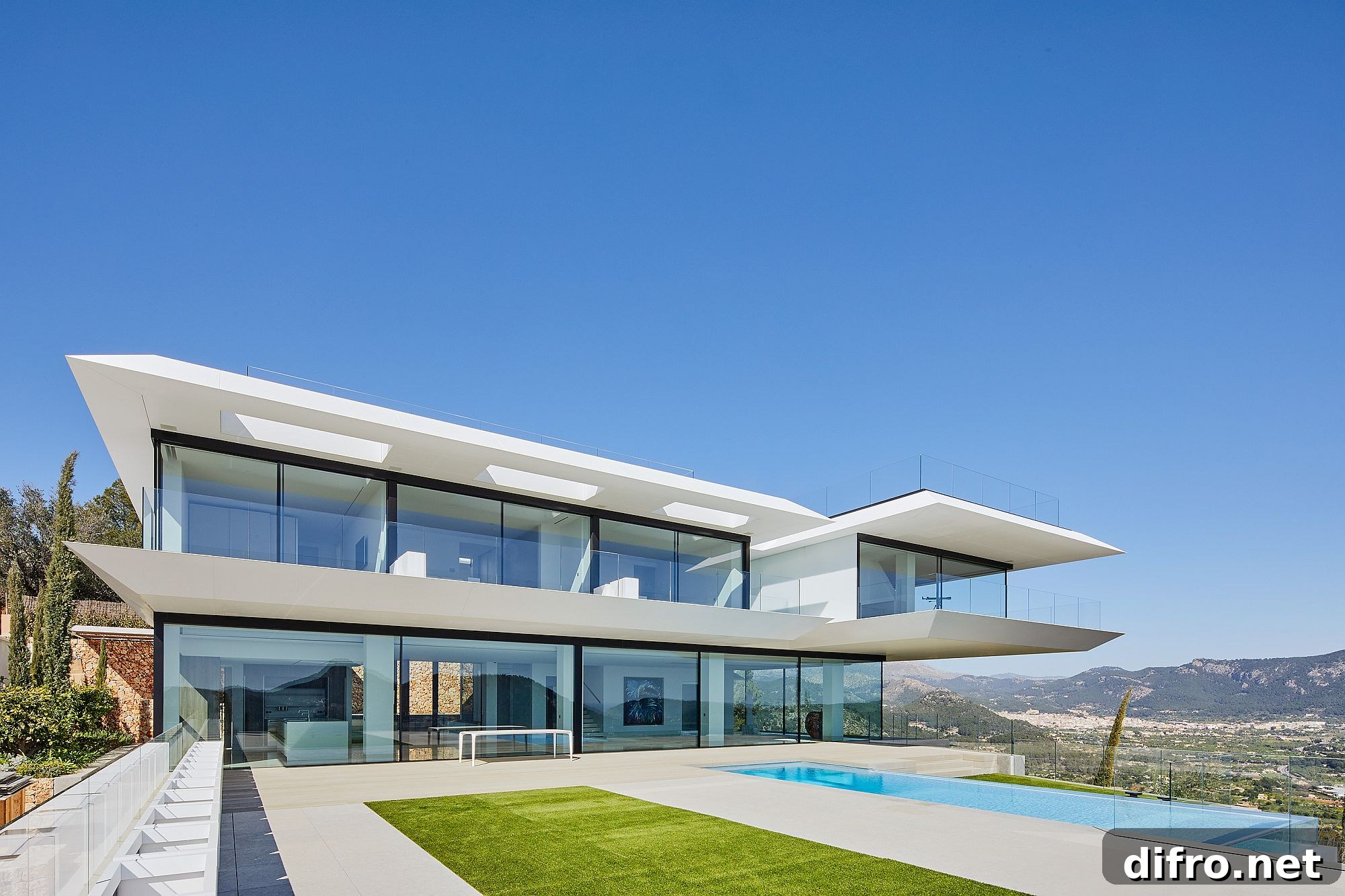 Minimal hilltop home facade with KRION