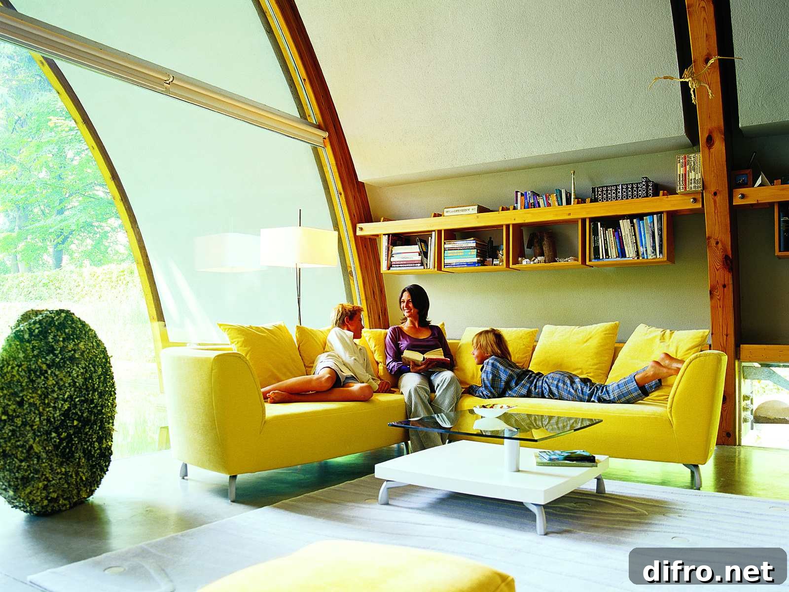 Sunlit modern living room with yellow sofa