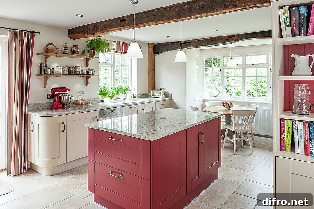 Modern farmhouse kitchen with red island