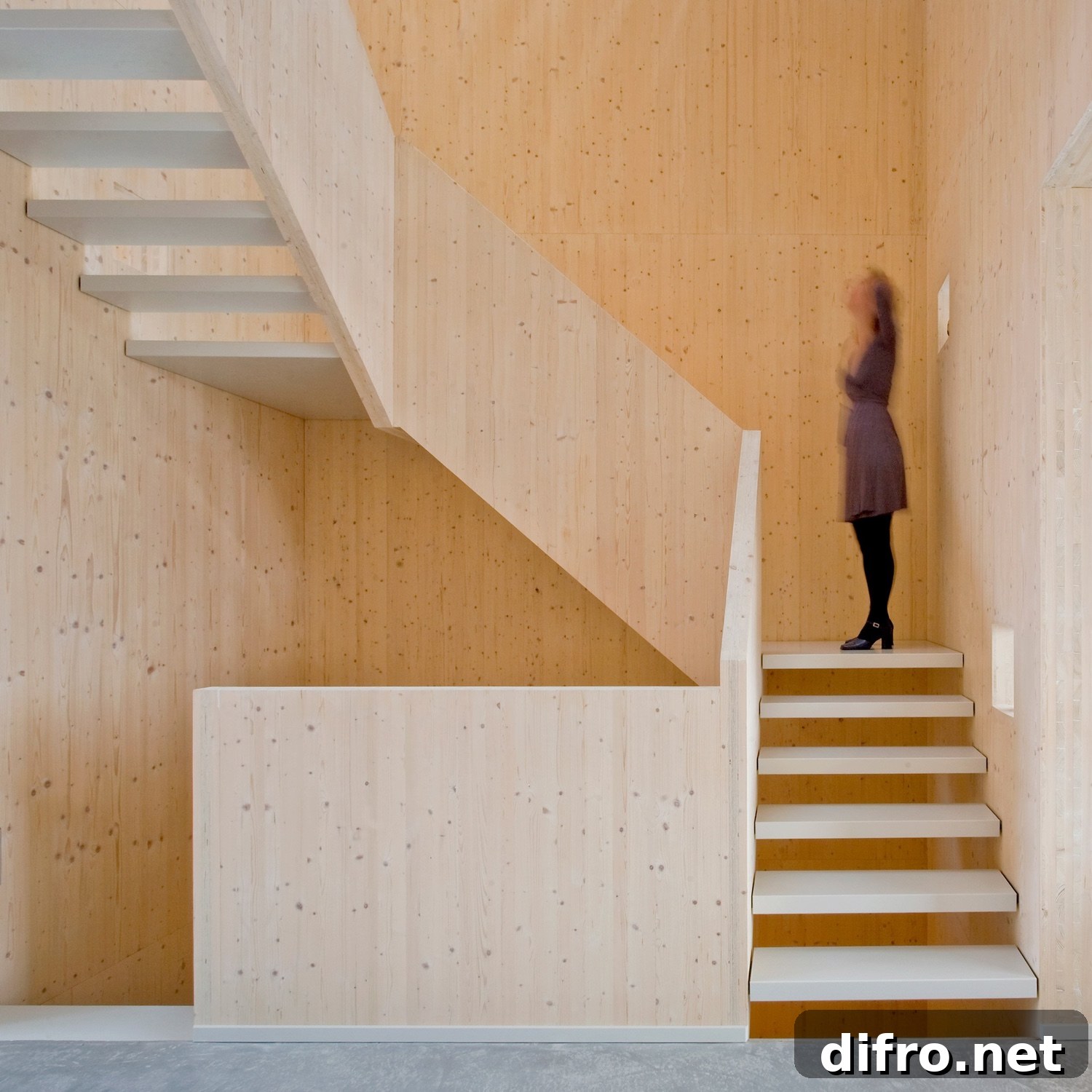 A pinewood stairwell is at the core of this five-storey townhouse.