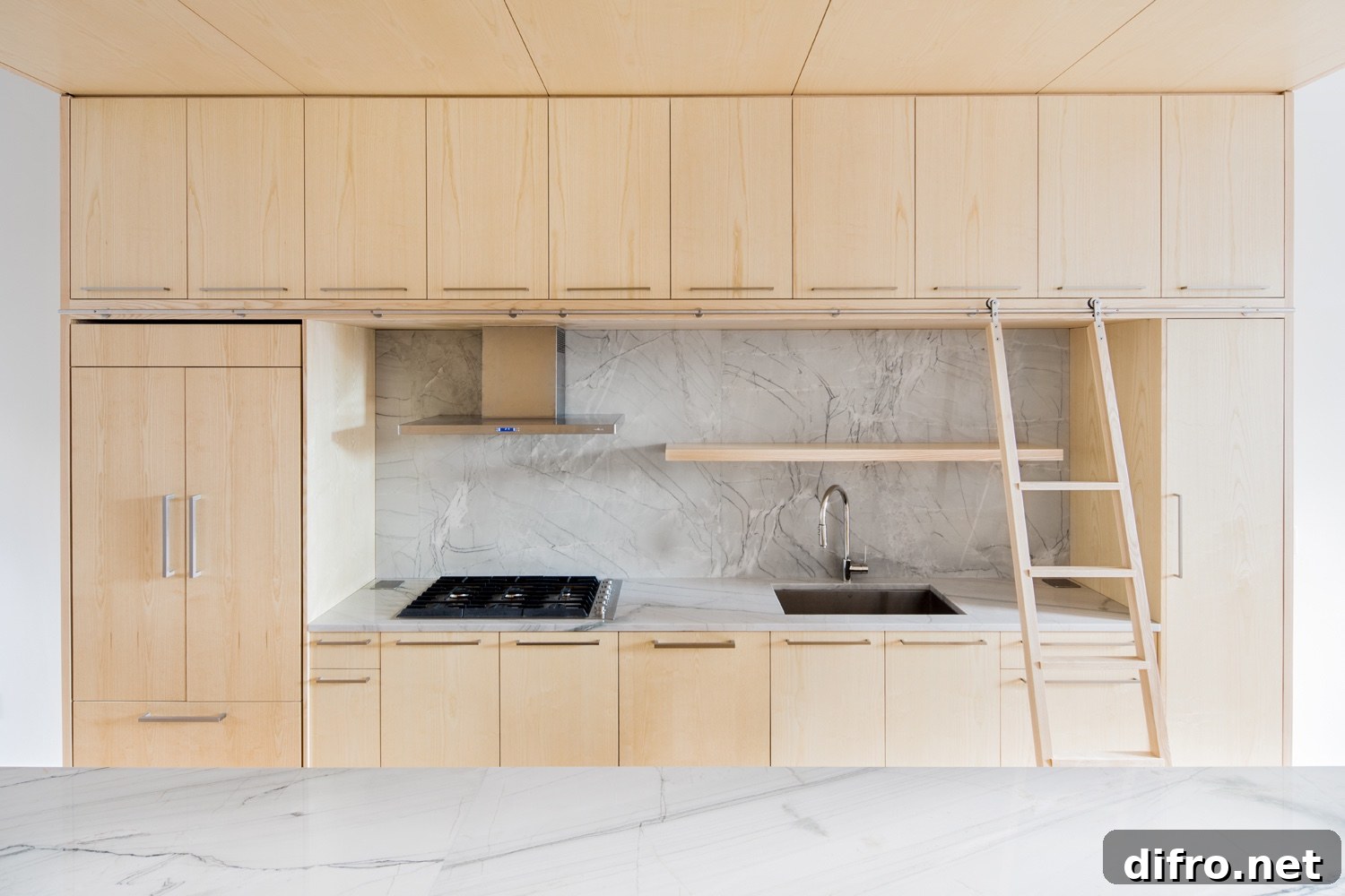 Modern pinewood kitchen cabinets in the Wayne Street Row House.