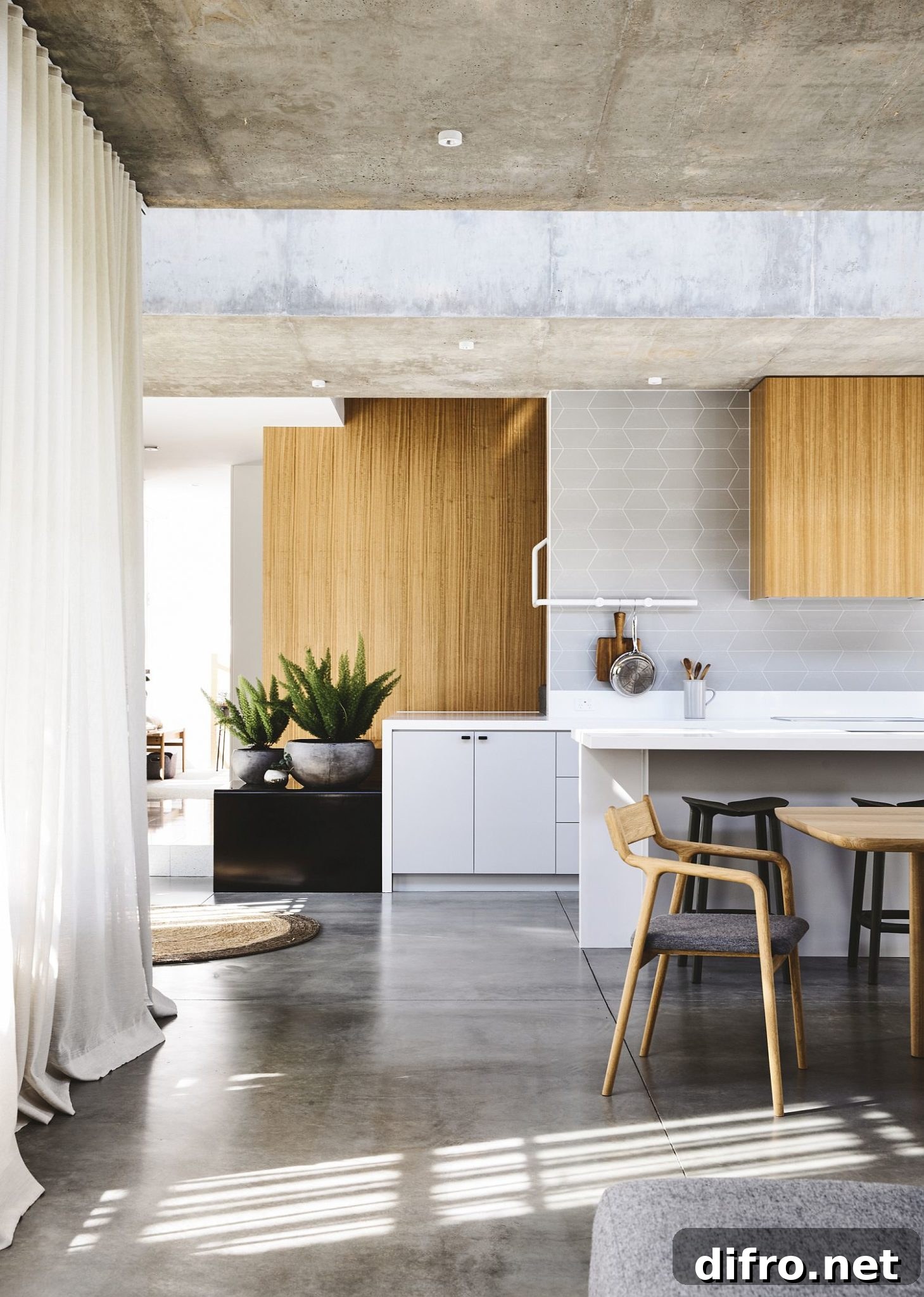 Wood surfaces contrast with exposed concrete