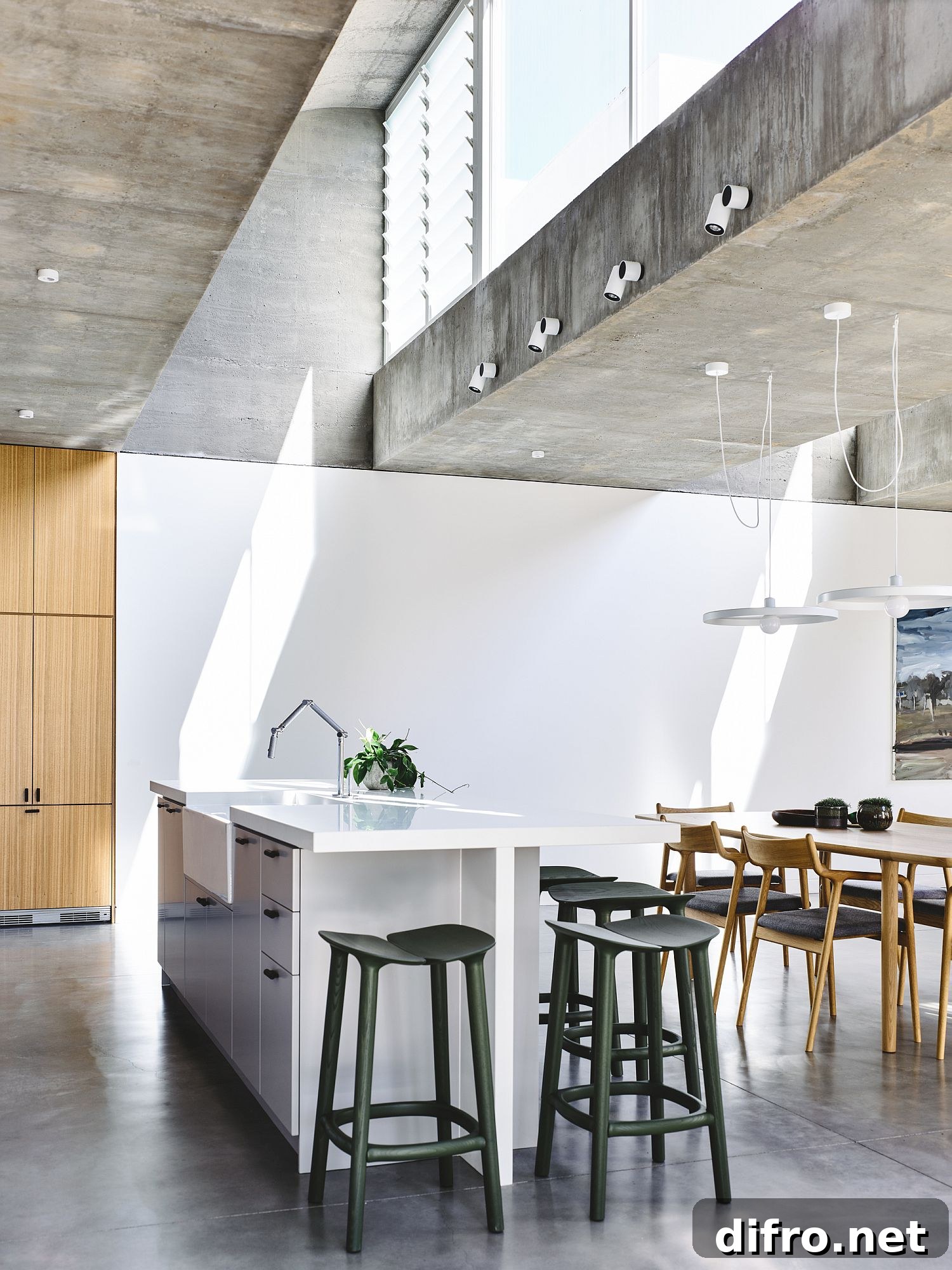 Polished floor and exposed concrete ceilings give a minimal appeal